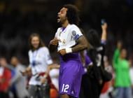 CARDIFF, WALES - JUNE 03:  Marcelo of Real Madrid celebrate victory after the UEFA Champions League Final between Juventus and Real Madrid at National Stadium of Wales on June 3, 2017 in Cardiff, Wales.  (Photo by Shaun Botterill/Getty Images)